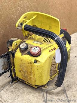 John Deere chainsaw with 20" roller tip bar and a near-new saw chain. Pulls over and has snappy