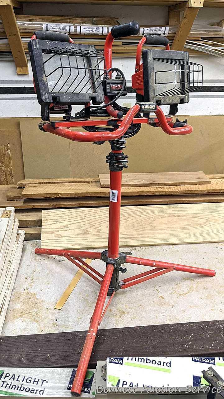 Husky 1000W work light set with dual lights, extendable poles, collapsing tripod and carry handle.