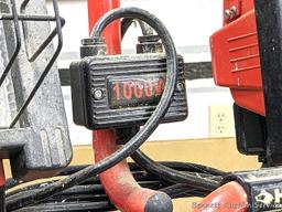 Husky 1000W work light set with dual lights, extendable poles, collapsing tripod and carry handle.