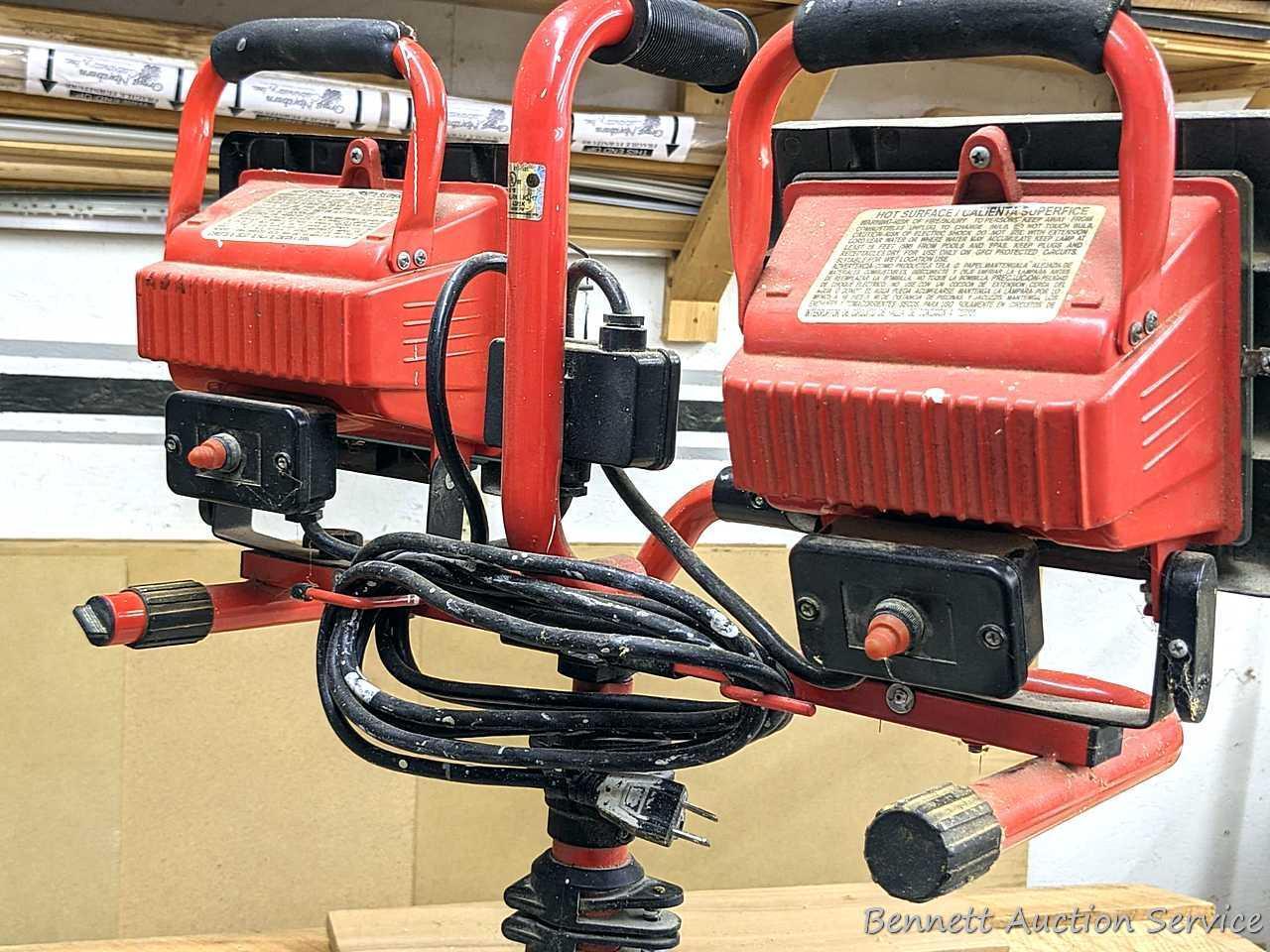 Husky 1000W work light set with dual lights, extendable poles, collapsing tripod and carry handle.