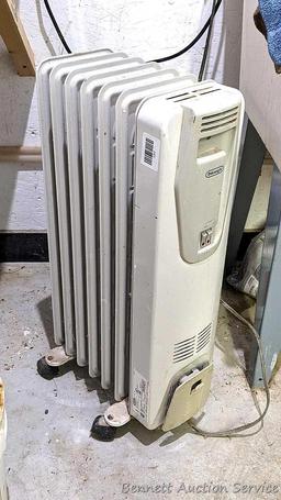 DeLonghi rolling heater, is type H250715L, turns on, heats, and measures 13"x10"x26" tall.
