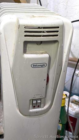 DeLonghi rolling heater, is type H250715L, turns on, heats, and measures 13"x10"x26" tall.