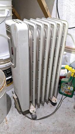DeLonghi rolling heater, is type H250715L, turns on, heats, and measures 13"x10"x26" tall.