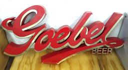 Goebel Beer sign is about 21" x 10" tall. Some wear on gold part but in good condition otherwise.