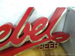 Goebel Beer sign is about 21" x 10" tall. Some wear on gold part but in good condition otherwise.