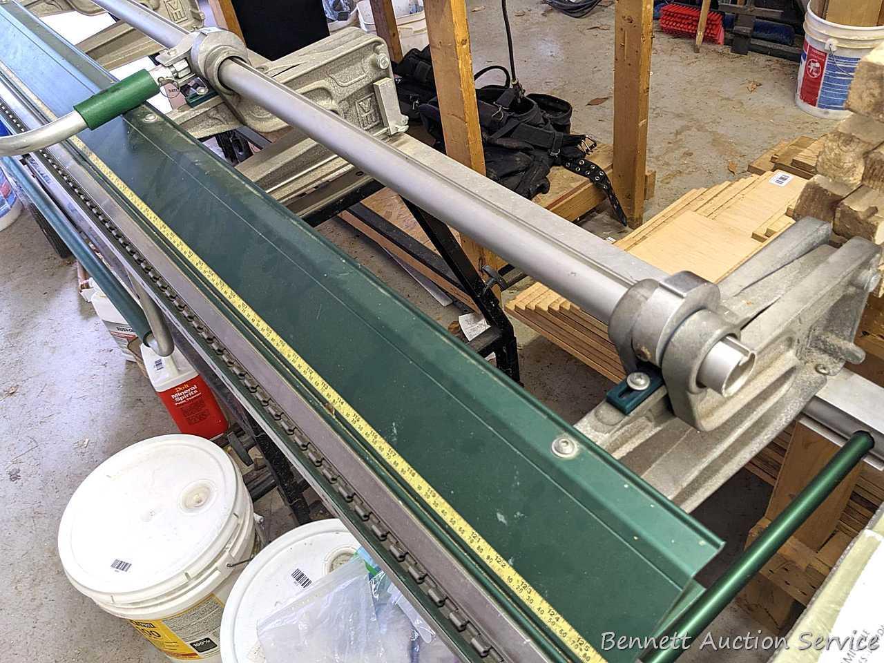 VanMark brand Mark II TrimMaster portable sheet metal brake is 10-1/2' long.