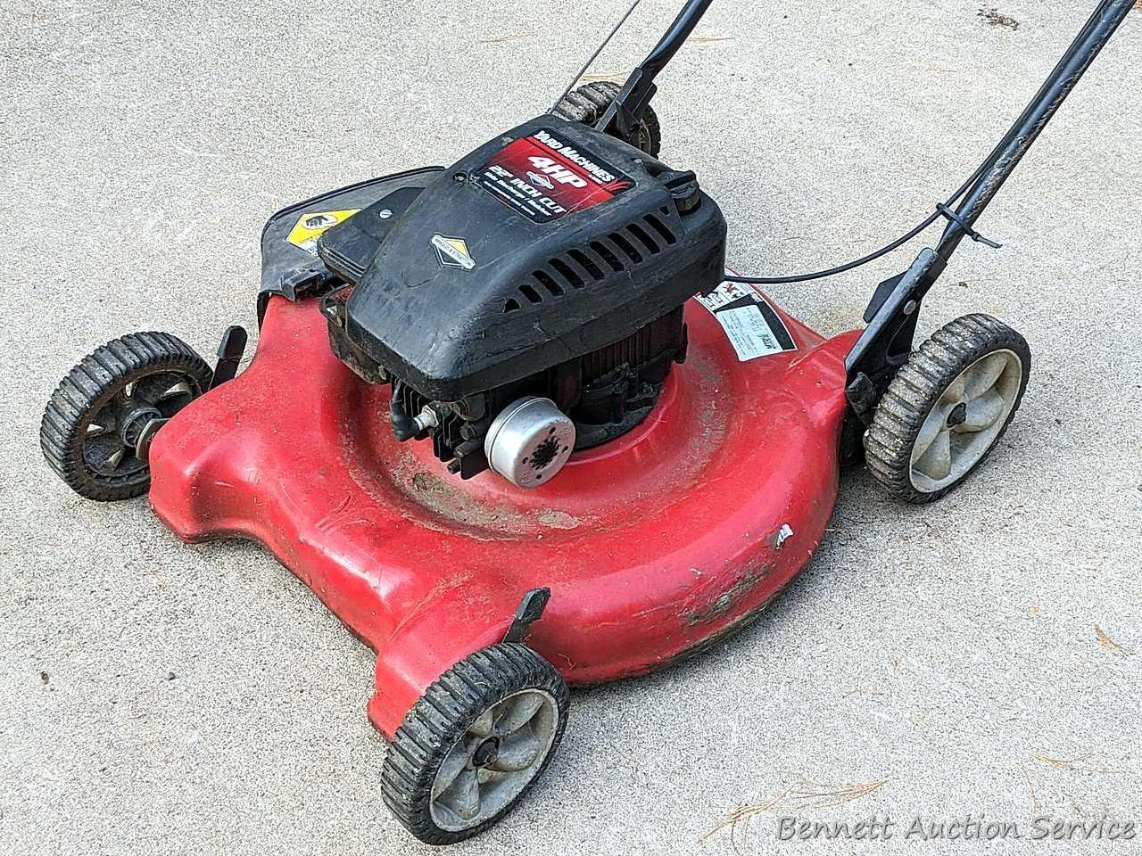 Yard Machines lawn mower with a 22" cut and a 4 HP Brigs and Stratton engine. The mower fired right