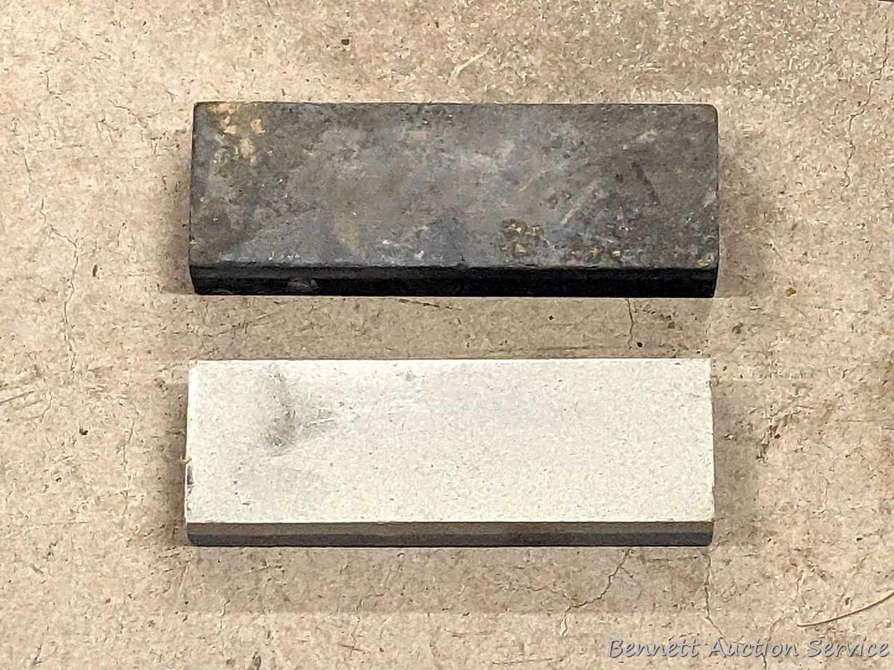 Rapala J. Marttiini stainless 11" filet knife; other 12" filet knife; two 6" sharpening stones and a