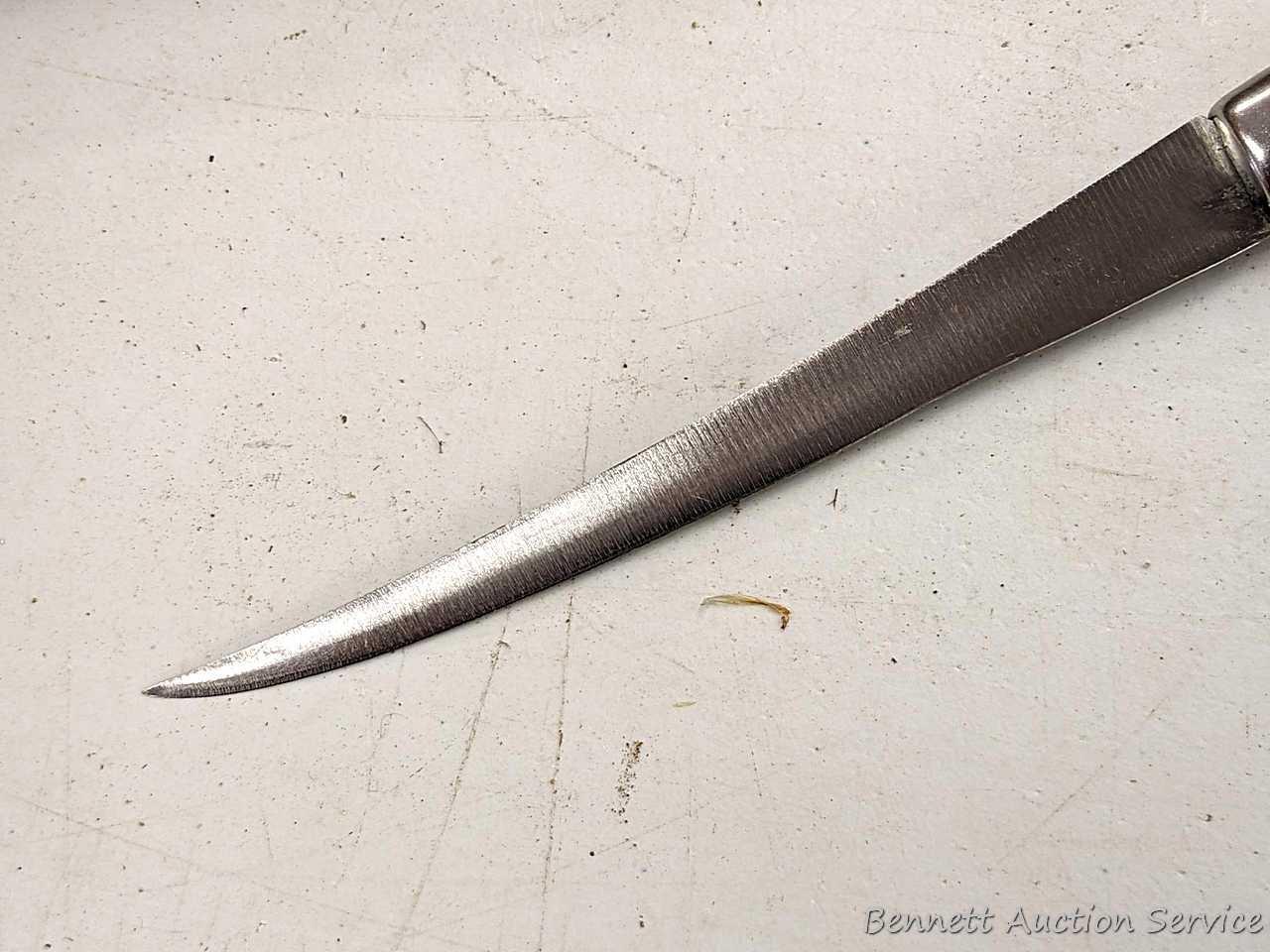 Rapala J. Marttiini stainless 11" filet knife; other 12" filet knife; two 6" sharpening stones and a