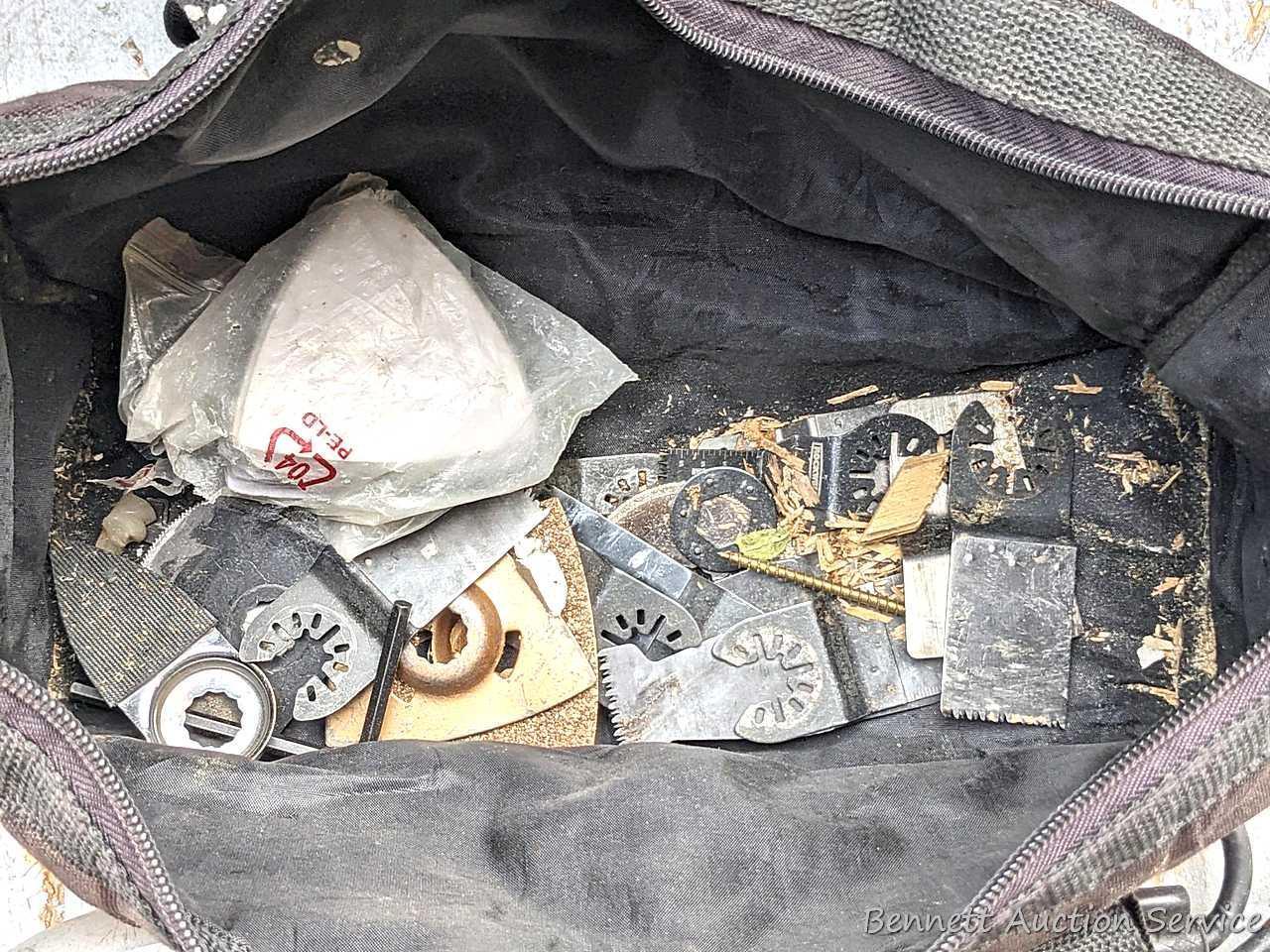 Rockwell SoniCrafter trim saw in bag and includes a variety of blades. Some blades appear to be