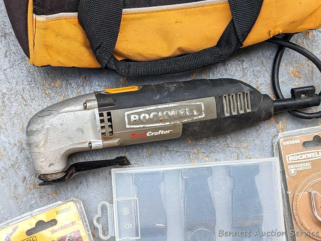 Rockwell SoniCrafter trim saw in bag and includes a variety of blades. Some blades appear to be