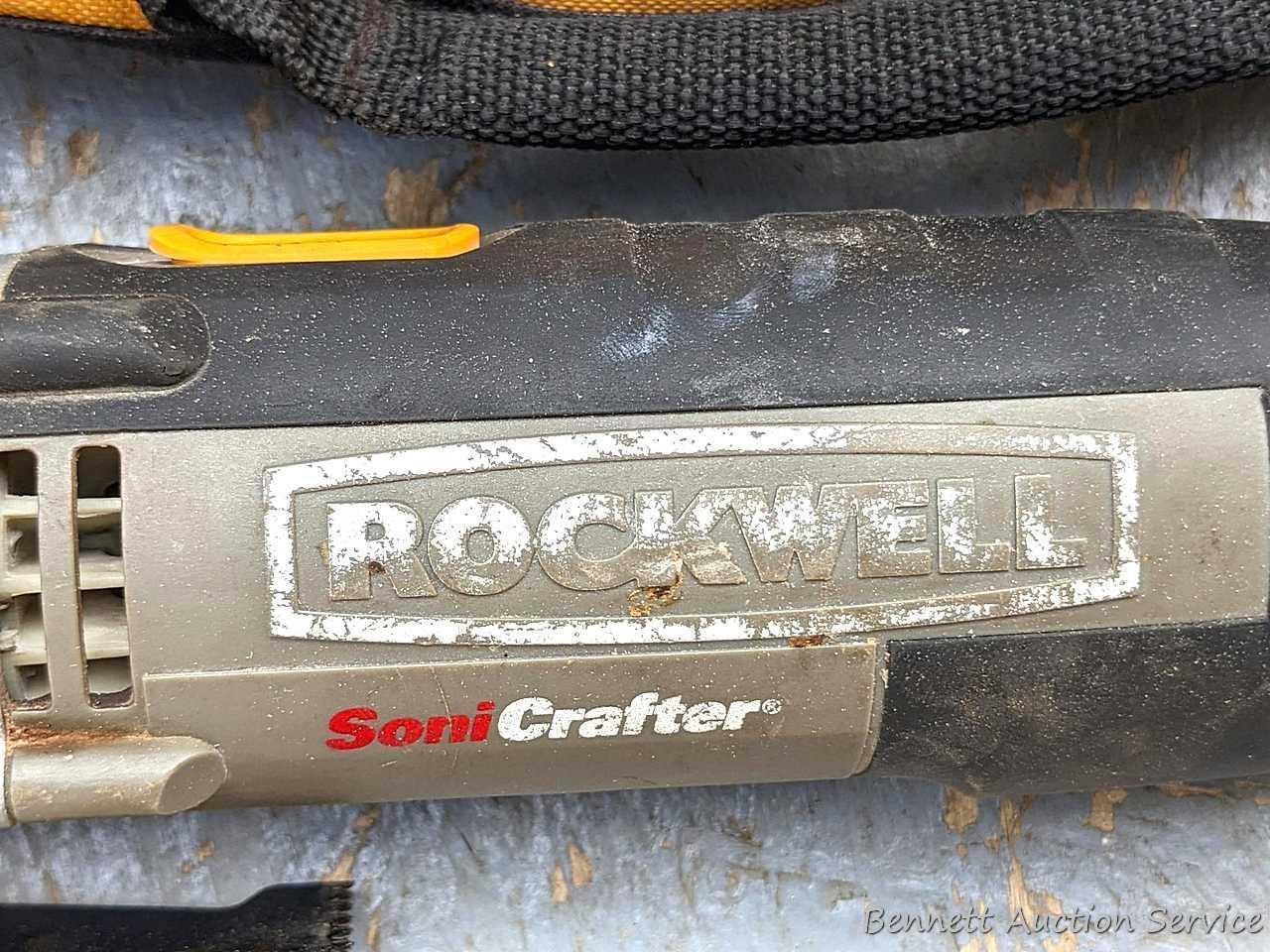 Rockwell SoniCrafter trim saw in bag and includes a variety of blades. Some blades appear to be