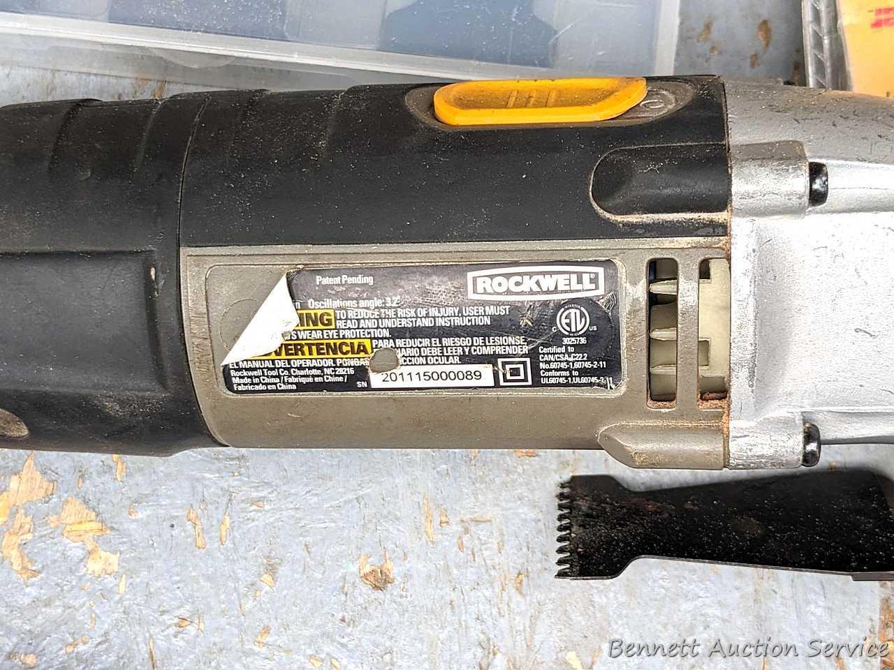 Rockwell SoniCrafter trim saw in bag and includes a variety of blades. Some blades appear to be