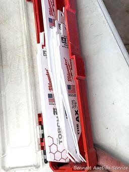 New and used Milwaukee reciprocating saw blades, mostly demolition blades.