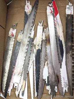 New and used Milwaukee reciprocating saw blades, mostly demolition blades.