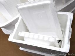 Five 28 qt coolers with lids and a couple smaller.