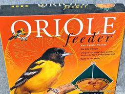 1 oriole feeder and 1 hummingbird feeder; 2 packages of instant nectar concentrate, one for orioles