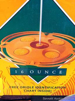 1 oriole feeder and 1 hummingbird feeder; 2 packages of instant nectar concentrate, one for orioles