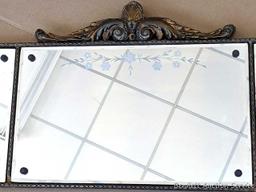Pretty antique buffet mirror has etched flowers on glass and beveled edges. Measures about 46" x 17"
