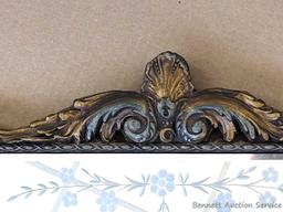Pretty antique buffet mirror has etched flowers on glass and beveled edges. Measures about 46" x 17"
