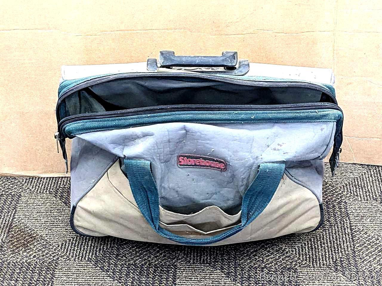 20" Storehouse rolling tool bag is in overall good condition, clean it up or use as-is. About 10"