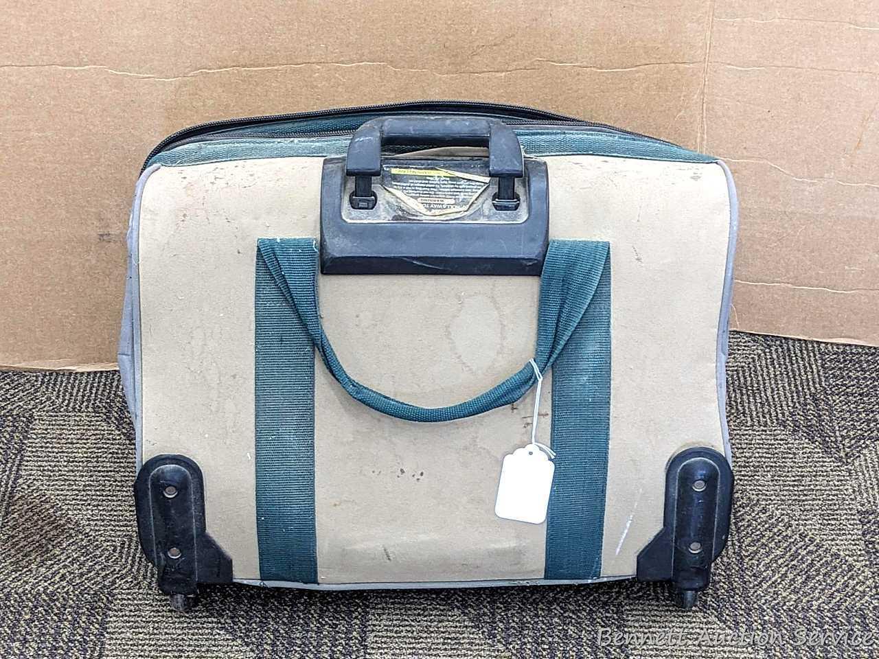 20" Storehouse rolling tool bag is in overall good condition, clean it up or use as-is. About 10"