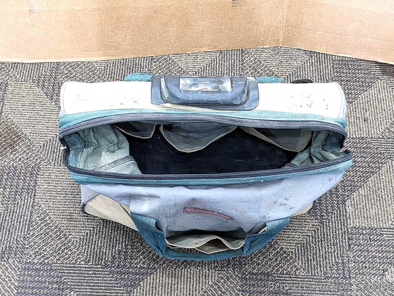 20" Storehouse rolling tool bag is in overall good condition, clean it up or use as-is. About 10"