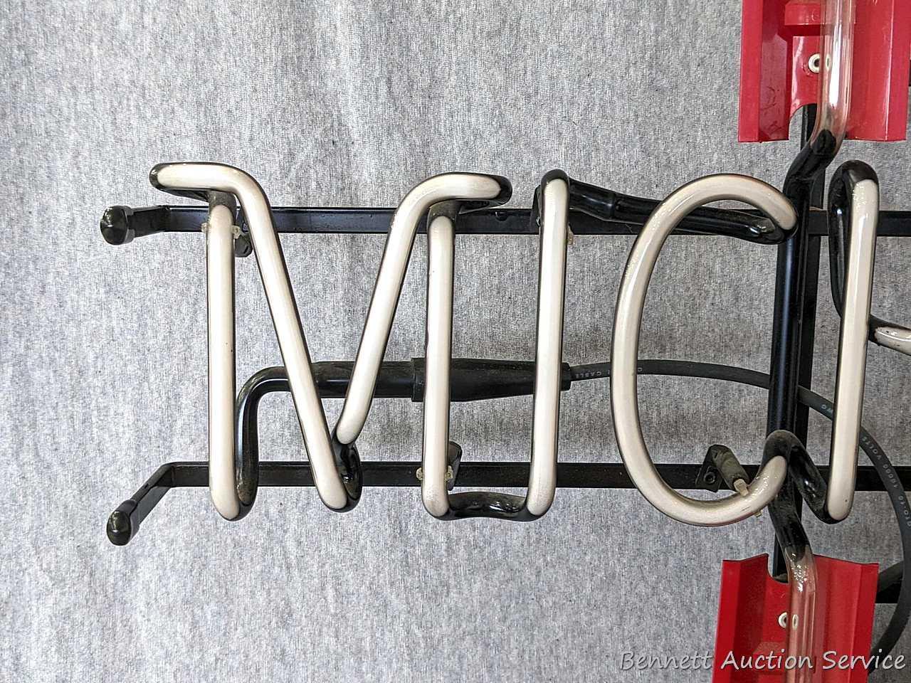 No shipping. Michelob beer neon light is about 25" x 20" x 6-1/2" deep. Works. Nice light.