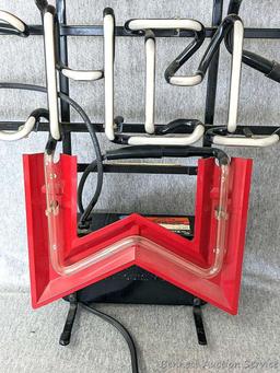 No shipping. Michelob beer neon light is about 25" x 20" x 6-1/2" deep. Works. Nice light.