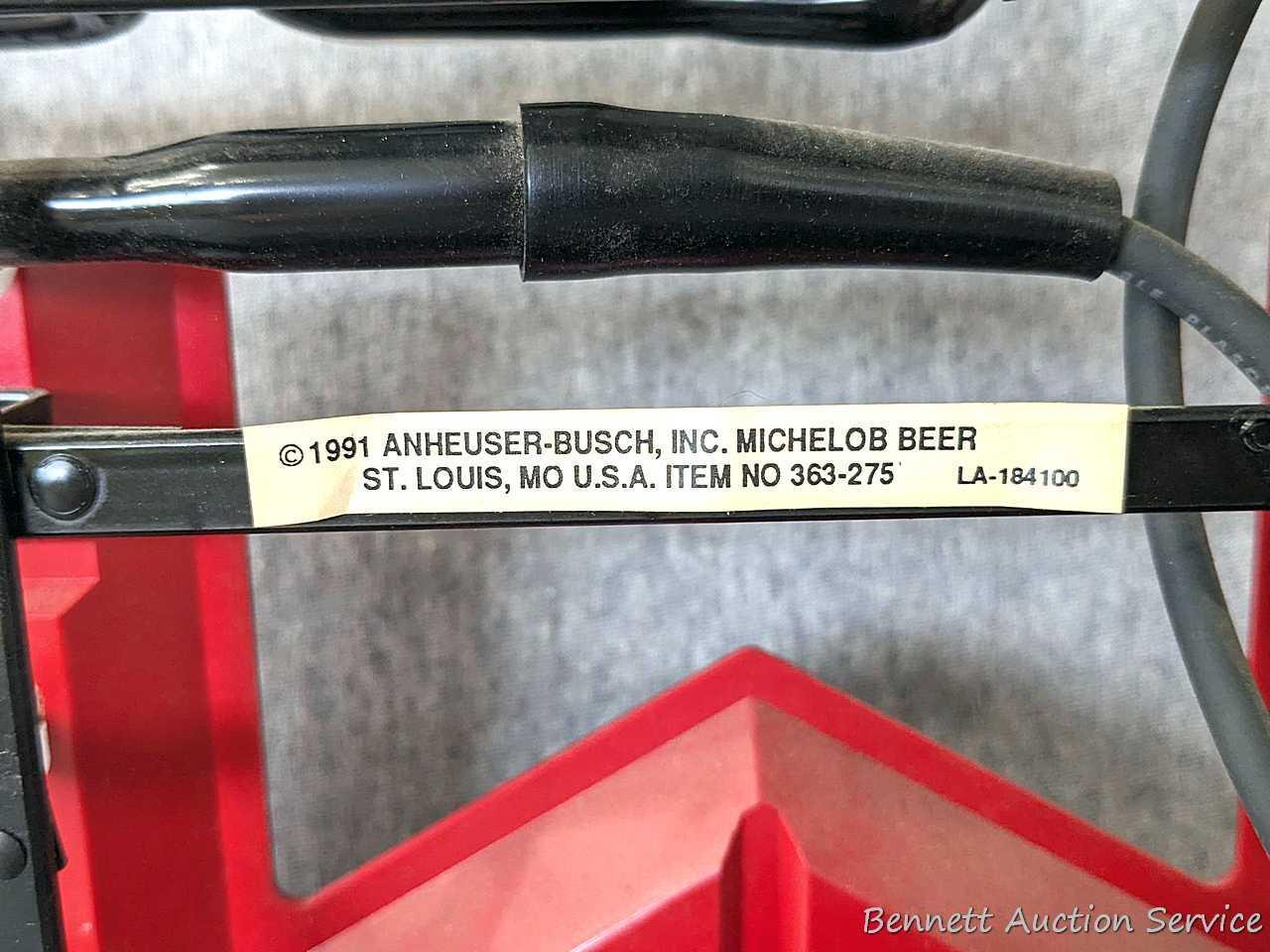 No shipping. Michelob beer neon light is about 25" x 20" x 6-1/2" deep. Works. Nice light.