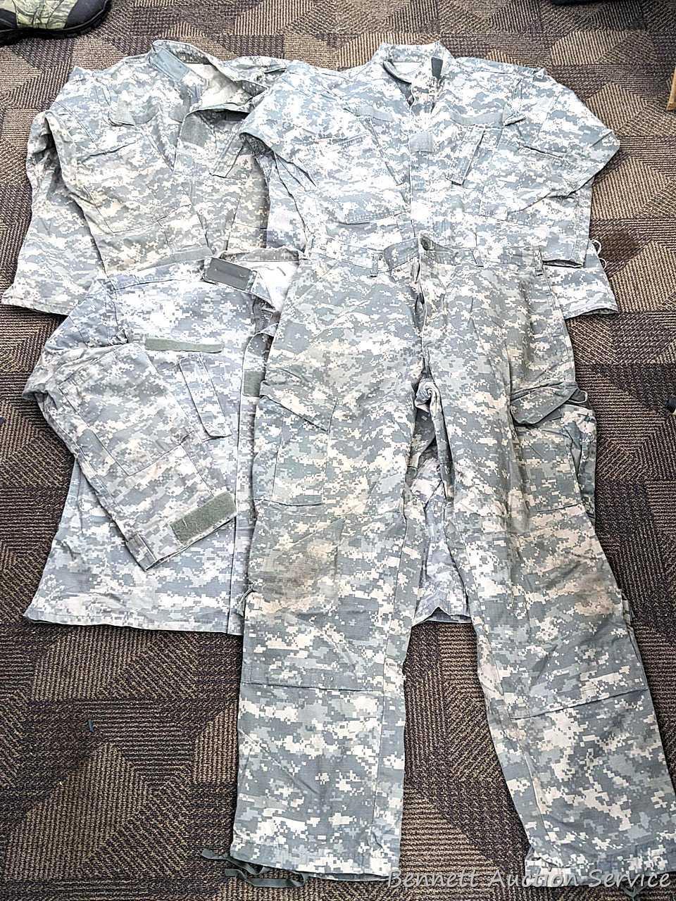US Military Army digital camouflage combat uniform and two extra coats of the same type. All coats