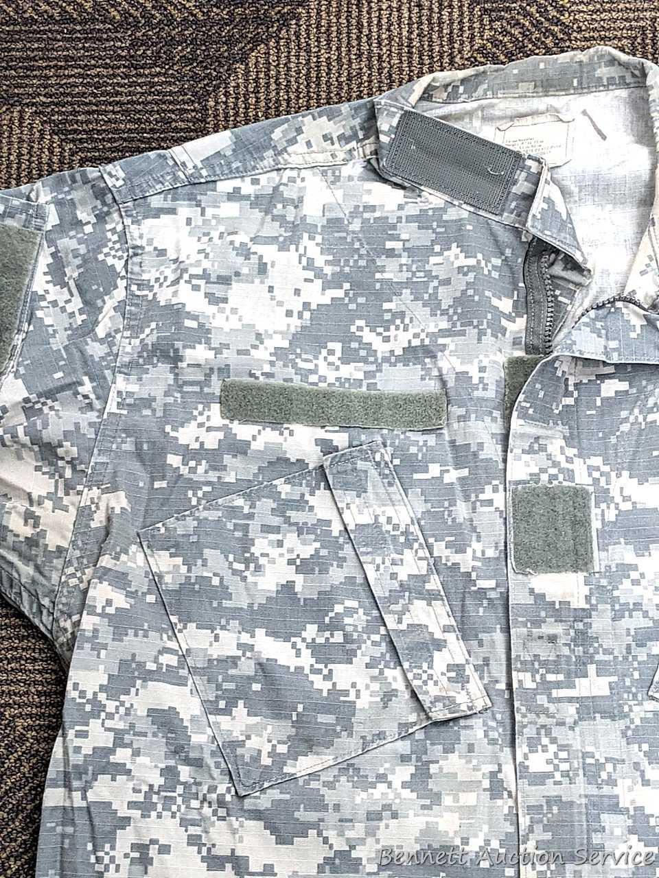 US Military Army digital camouflage combat uniform and two extra coats of the same type. All coats