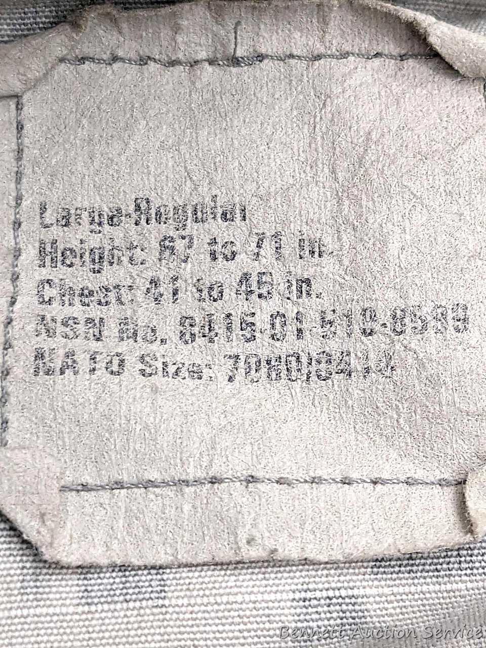 US Military Army digital camouflage combat uniform and two extra coats of the same type. All coats