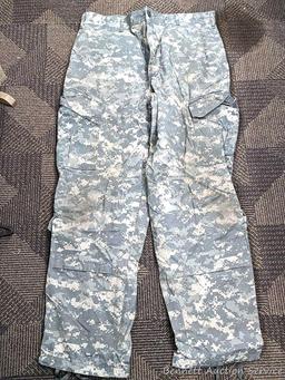 US Military Army digital camouflage combat uniform and two extra coats of the same type. All coats