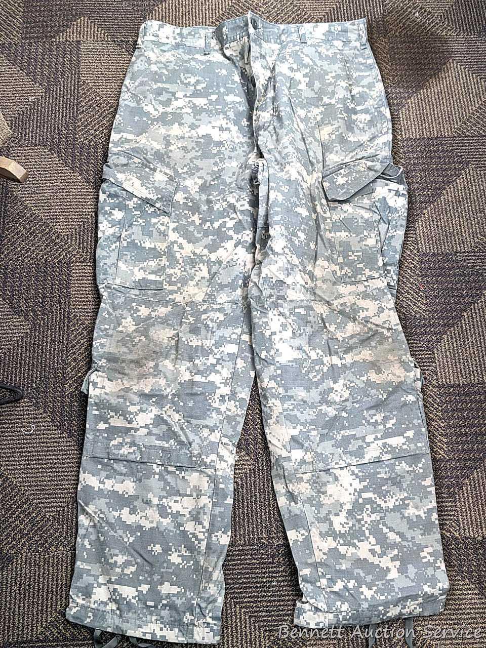 US Military Army digital camouflage combat uniform and two extra coats of the same type. All coats