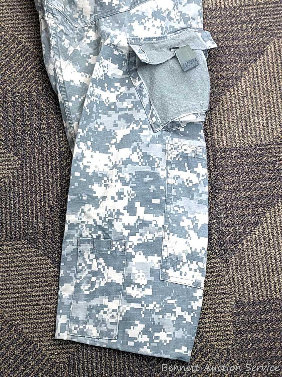 US Military Army digital camouflage combat uniform and two extra coats of the same type. All coats