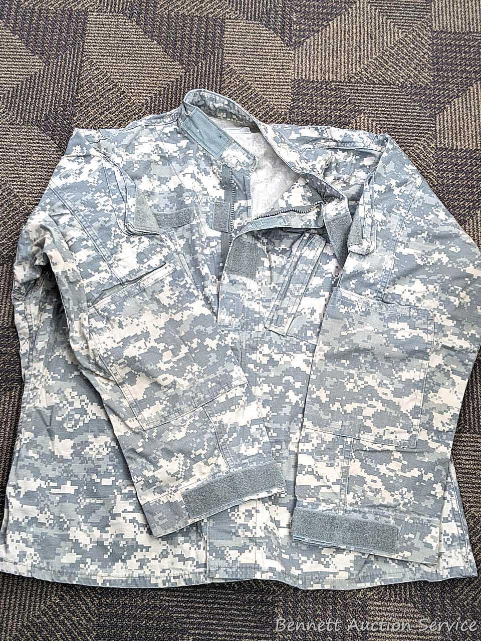 US Military Army digital camouflage combat uniform and two extra coats of the same type. All coats