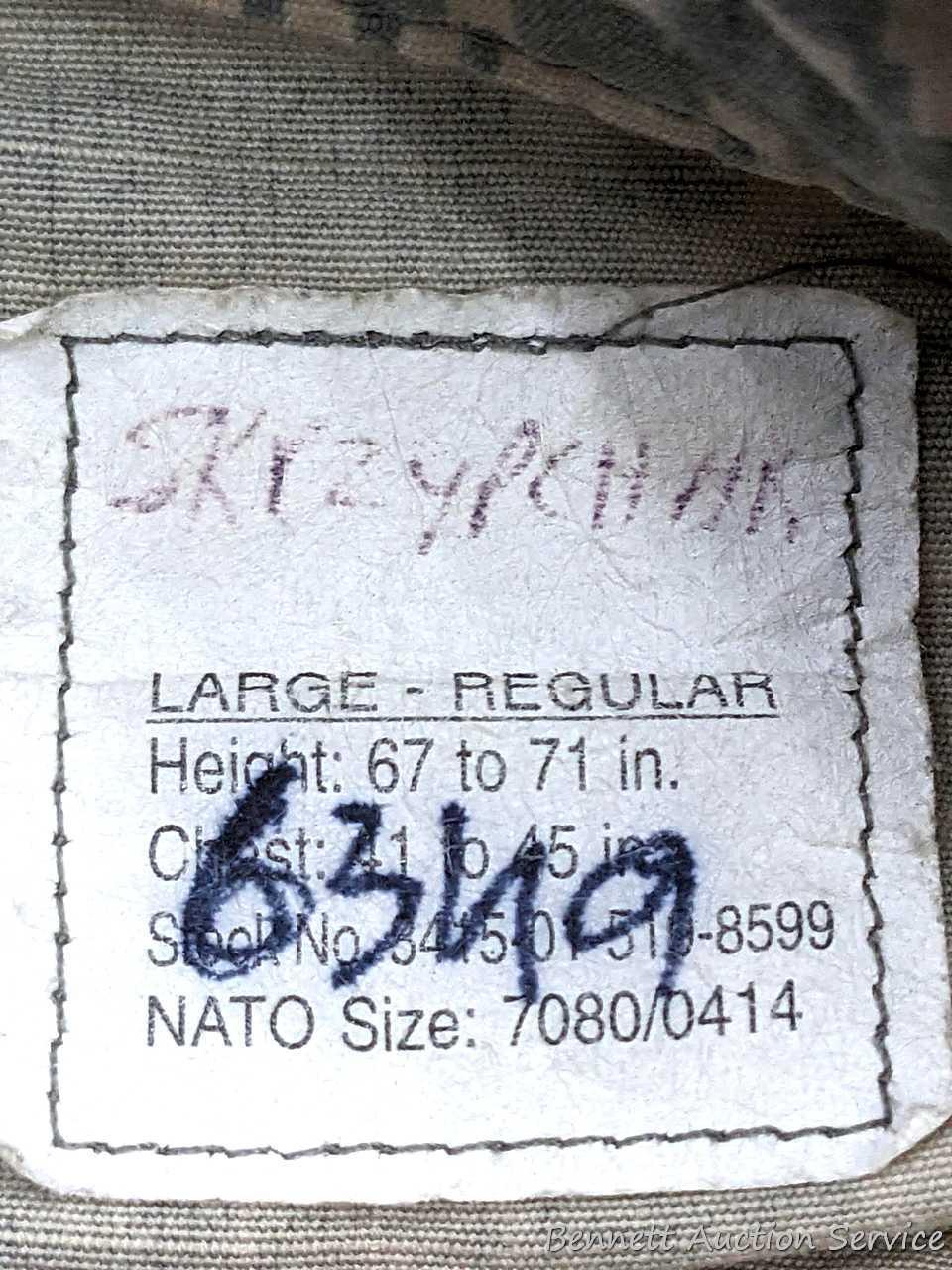 US Military Army digital camouflage combat uniform and two extra coats of the same type. All coats