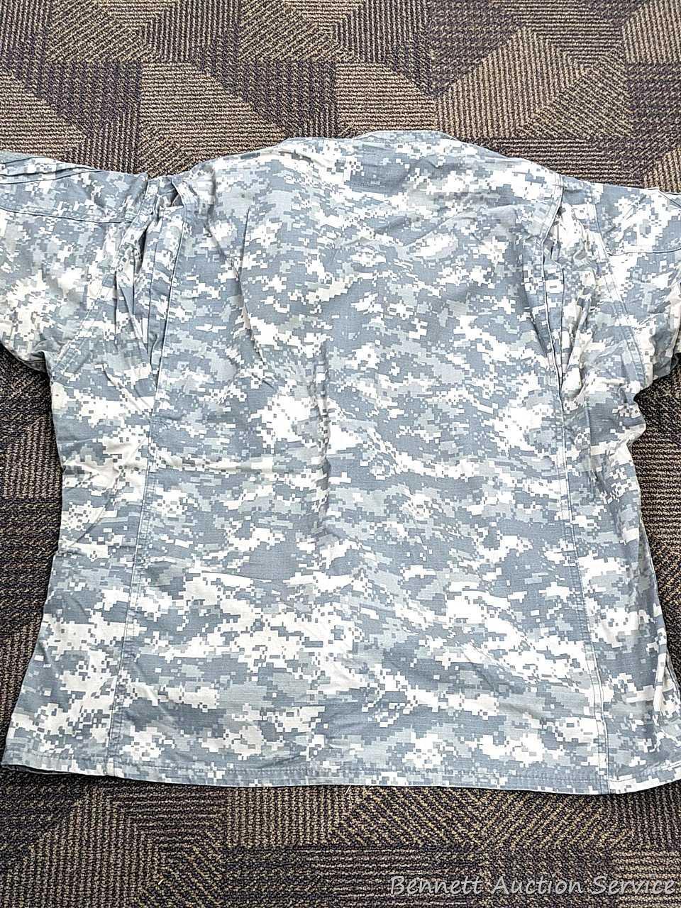 US Military Army digital camouflage combat uniform and two extra coats of the same type. All coats