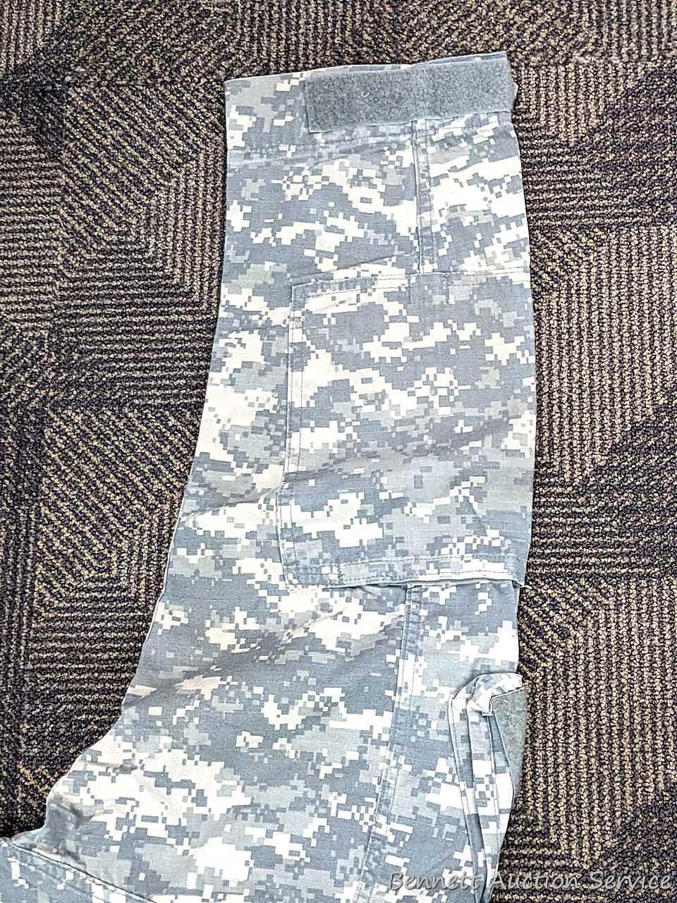 US Military Army digital camouflage combat uniform and two extra coats of the same type. All coats