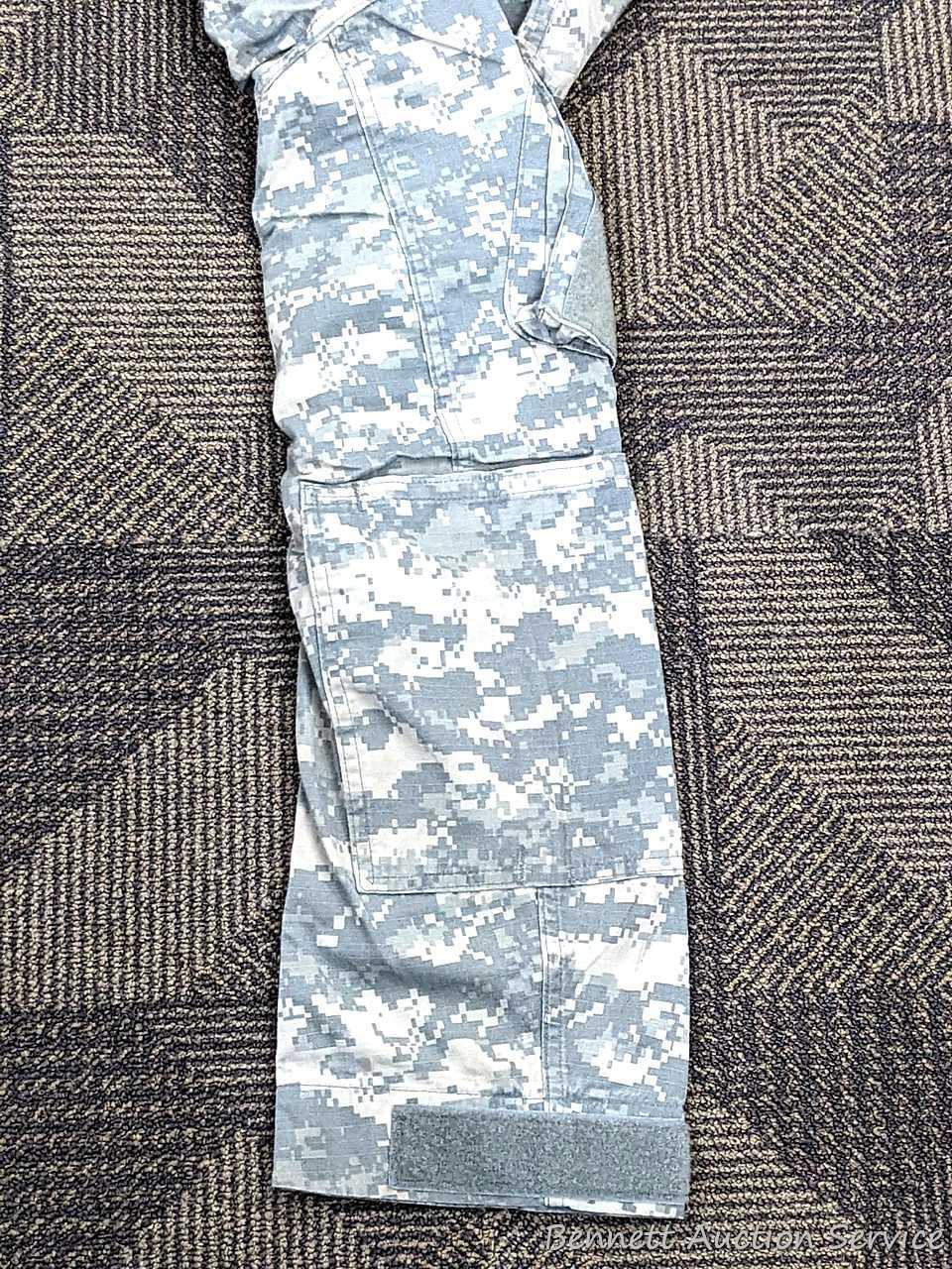 US Military Army digital camouflage combat uniform and two extra coats of the same type. All coats