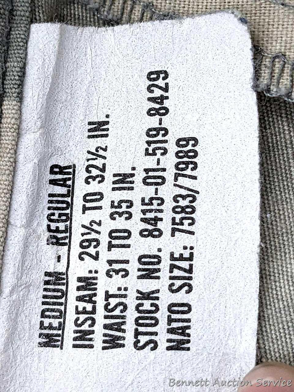 US Military Army digital camouflage combat uniform and two extra coats of the same type. All coats