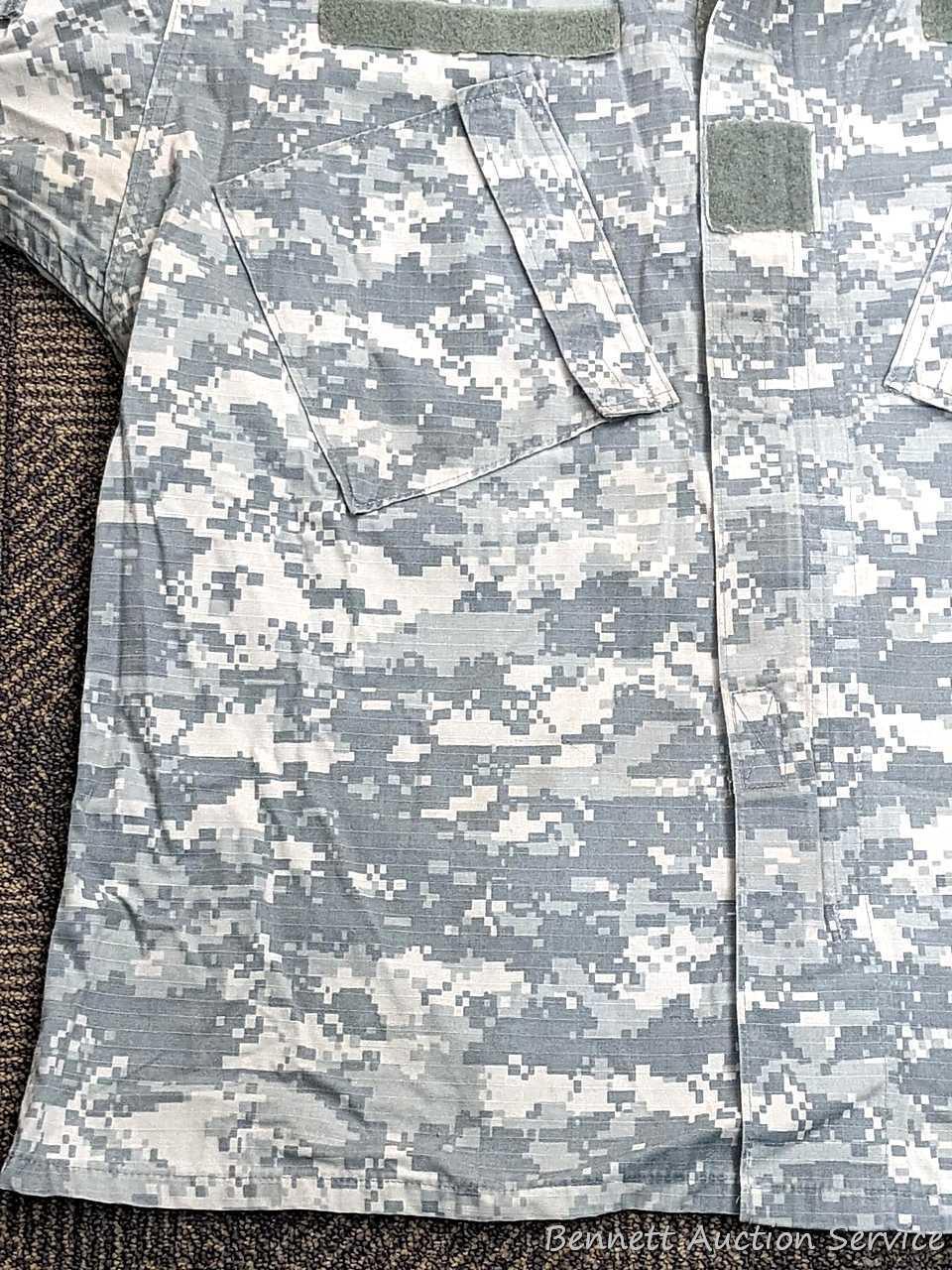 US Military Army digital camouflage combat uniform and two extra coats of the same type. All coats