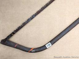 Bow saw is nearly 4' long.