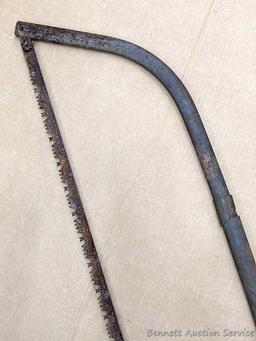 Bow saw is nearly 4' long.