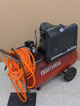 Craftsman 5 hp 20 gallon portable air compressor with air hose requires a 20 amp 110 volt