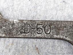 Vintage John Deer open end wrench with a 3/8" square hole. The wrench is 6" overall and is marked