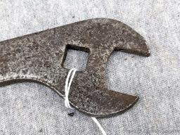 Vintage John Deer open end wrench with a 3/8" square hole. The wrench is 6" overall and is marked