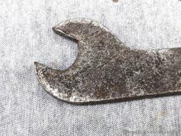 Vintage John Deer open end wrench with a 3/8" square hole. The wrench is 6" overall and is marked