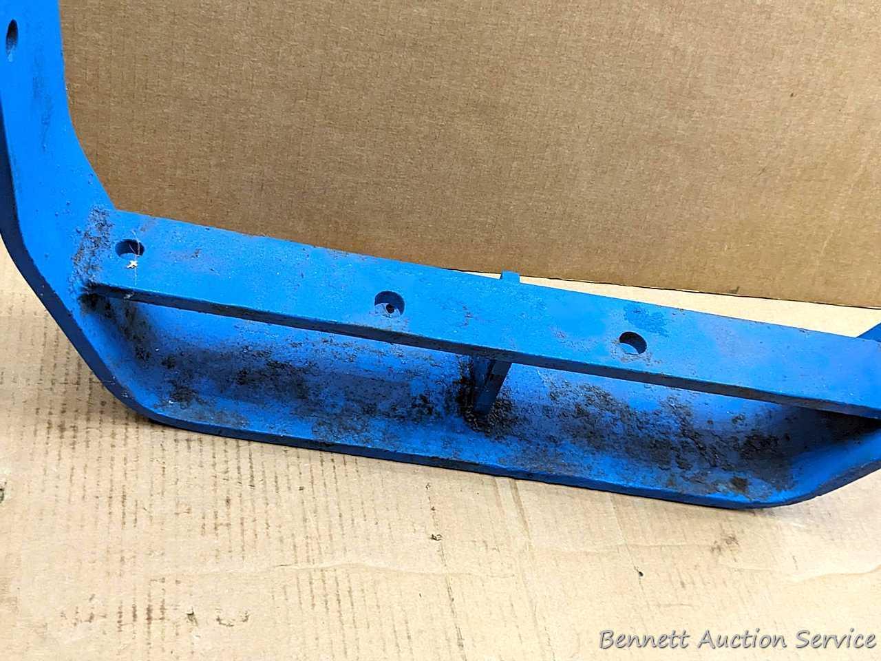 Tractor suitcase weight rack may fit your blue tractor. 2' wide.